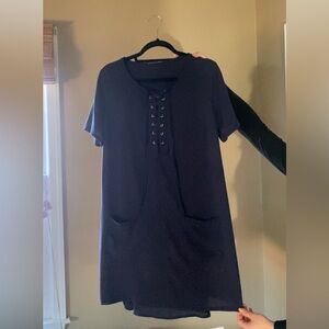 Navy blue slip dress with pockets and lace up collar